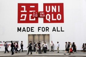 A sign for Uniqlo is shown on its store, Tuesday, Oct. 11, 2011 in New York.  The Japanese retailer is opening a Fifth Avenue flagship store, Friday, Oct. 14. (AP Photo/Mark Lennihan)